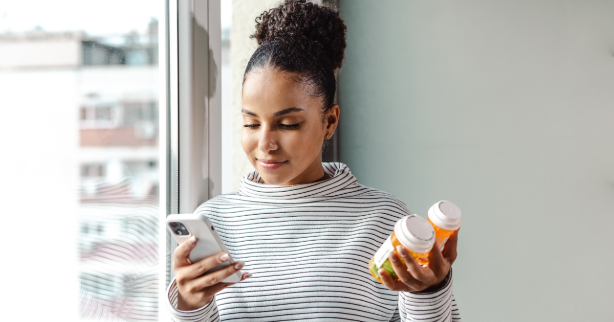 Woman looking at Medications on her phone